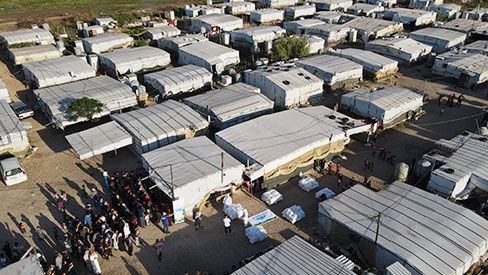  Fitrana recipients gathering in a camp - Lebanon